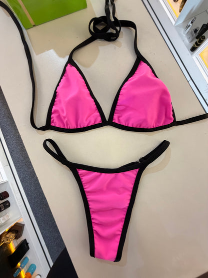 Bikini bi color rosa ribete negro